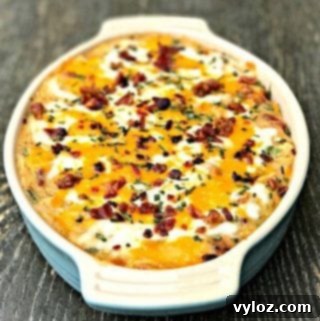 Instant Pot Bacon Chicken Ranch Baked Potato Casserole in a baking dish