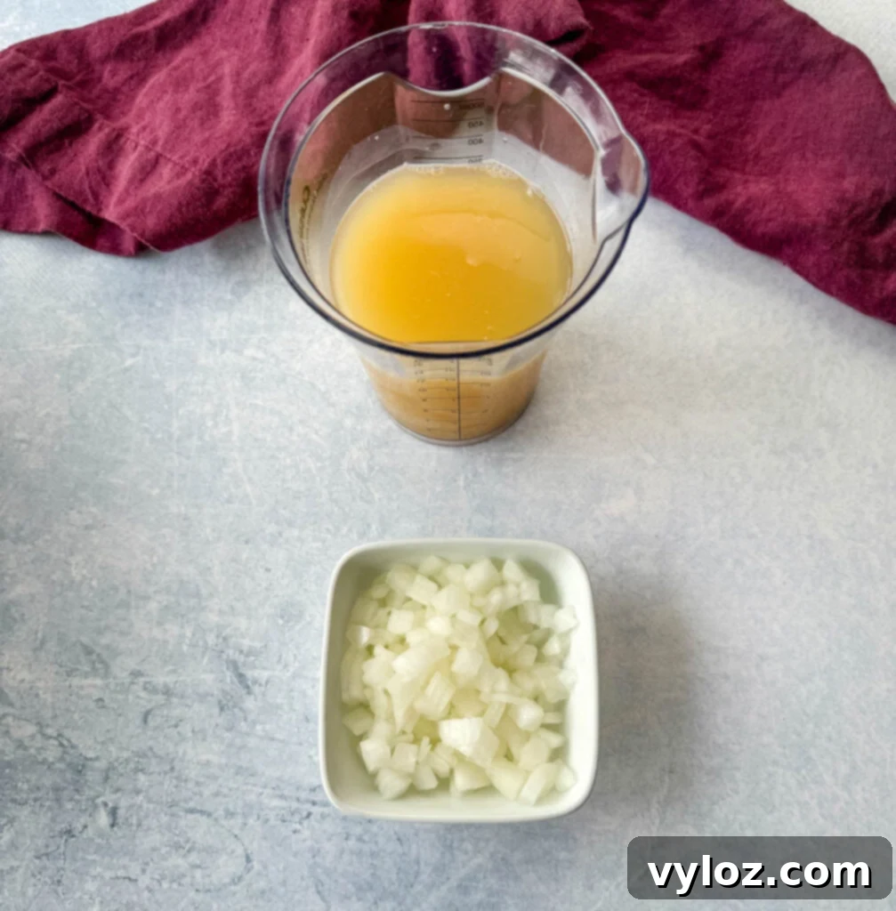 Southern Mixed Greens Medley 4 Chopped onions and flavorful broth are shown in individual bowls, essential components for the greens recipe.