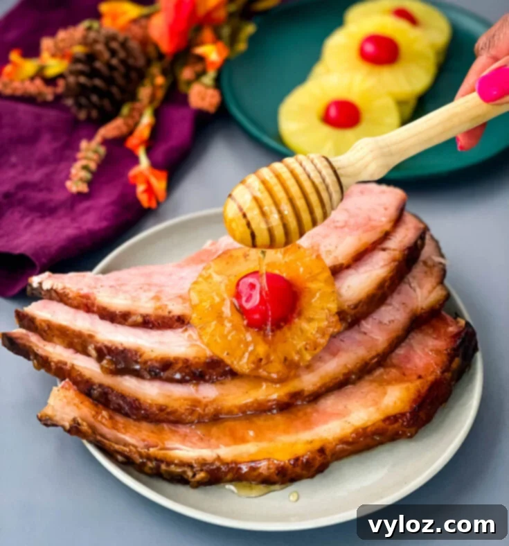 Southern Baked Ham with Pineapple, glazed and topped with cherries