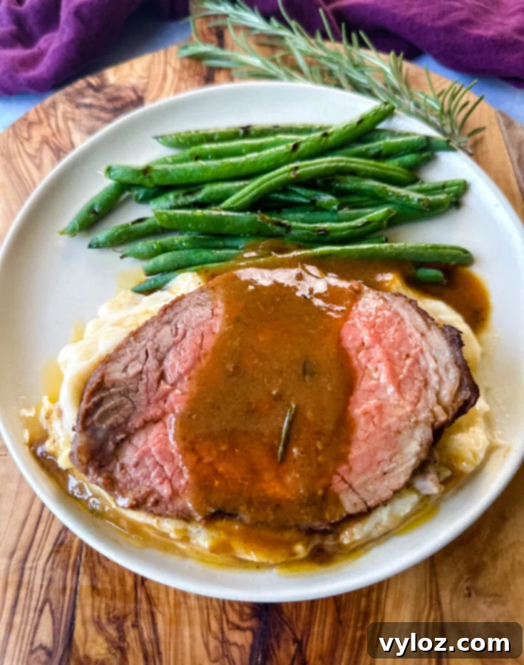 Juicy Eye of Round Roast Beef, perfectly seasoned and roasted