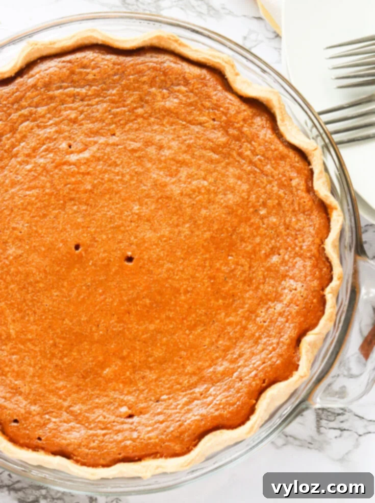 Classic Sweet Potato Pie with a buttery, crispy crust and warm spices