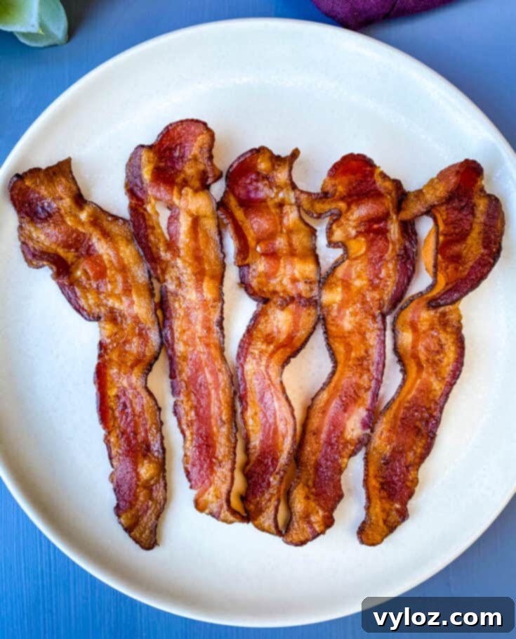 Easy Air Fryer Bacon, crispy and perfect in 10 minutes with no smoke