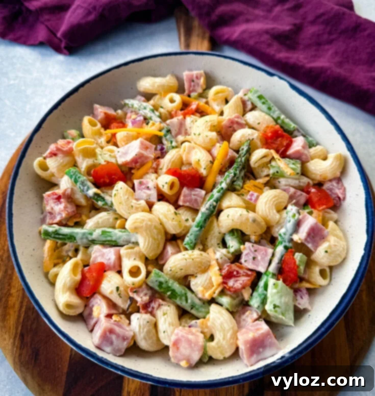 Ham Pasta Salad with tender pasta, savory ham, creamy cheese, and crisp vegetables