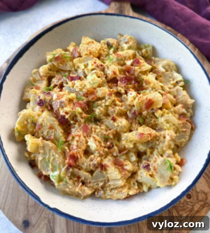 Mouthwatering Potato Salad with Bacon, creamy dressing and smoky goodness