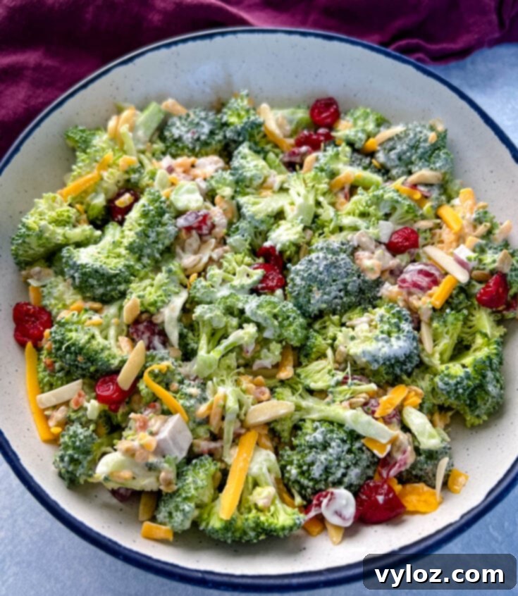 Easy Broccoli Salad with real bacon bits and cheese, served cold
