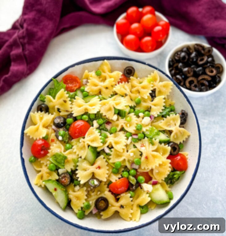 Bow Tie Pasta Salad with Italian Dressing, feta cheese, tomatoes, and olives