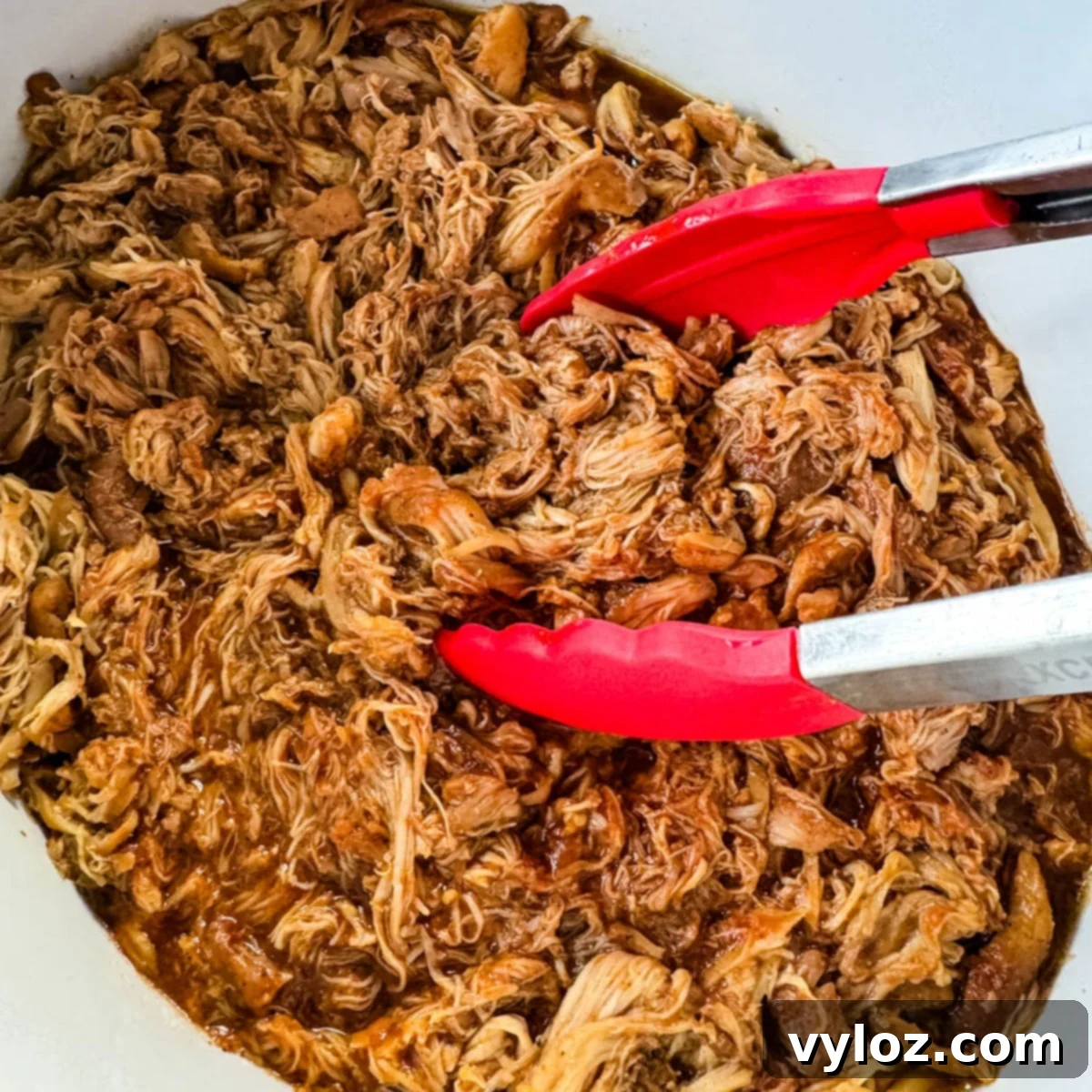 Succulent Slow Cooker Crockpot Pulled Chicken with homemade rub and BBQ sauce