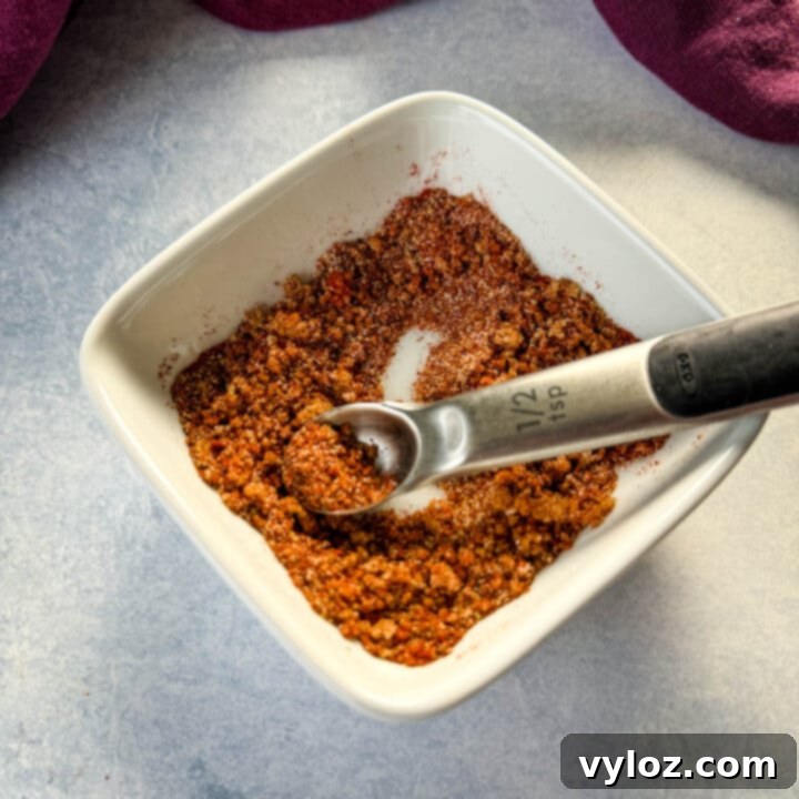 Dry Rub Recipe for Ribs with a blend of spices, herbs, sweetness, and smokiness