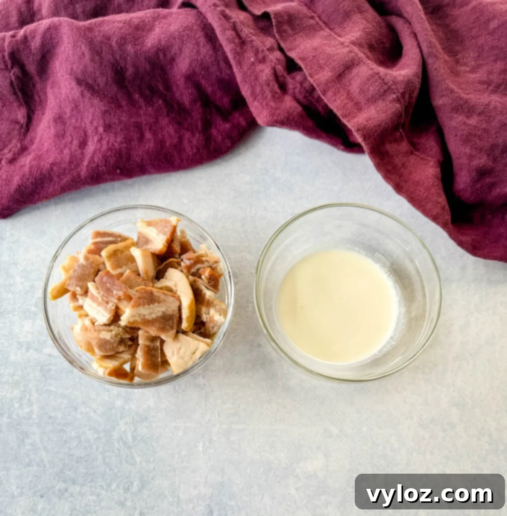 Golden Crispy Fried Corn 3 chopped bacon and heavy whipping cream in separate glass bowls