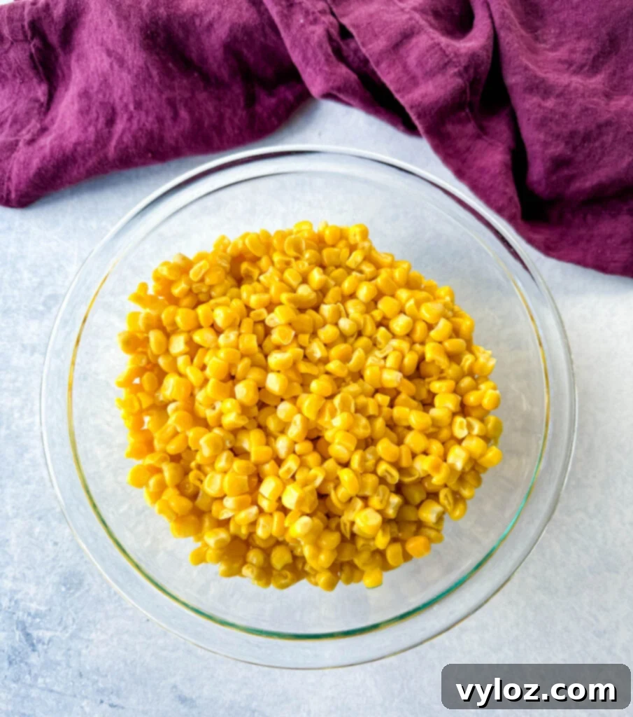 Golden Crispy Fried Corn 4 whole kernel corn in a glass bowl
