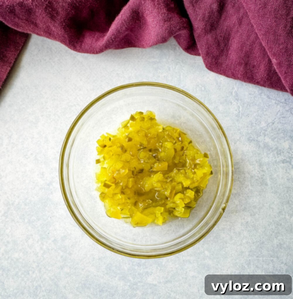 Classic Creamy Ham Salad 5 pickle relish in a glass bowl