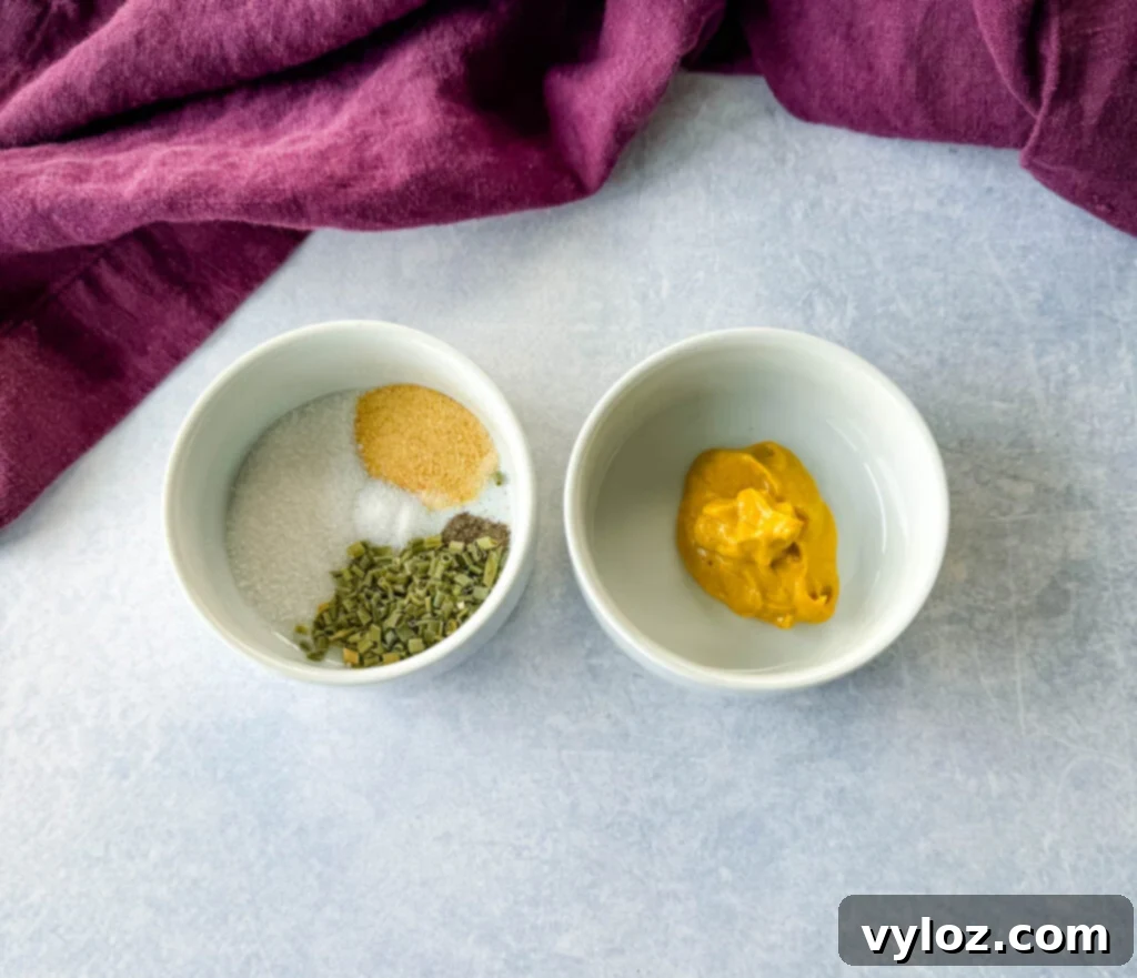 Zingy Dill Pasta Salad 5 A selection of spices and a dollop of mustard in small white bowls, ready to be incorporated into the savory dressing mixture.