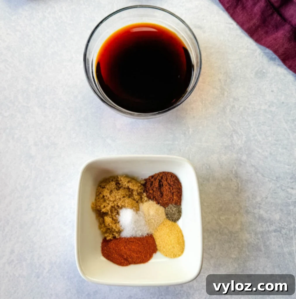 soy sauce, and homemade BBQ chicken rub spices in separate white and glass bowls