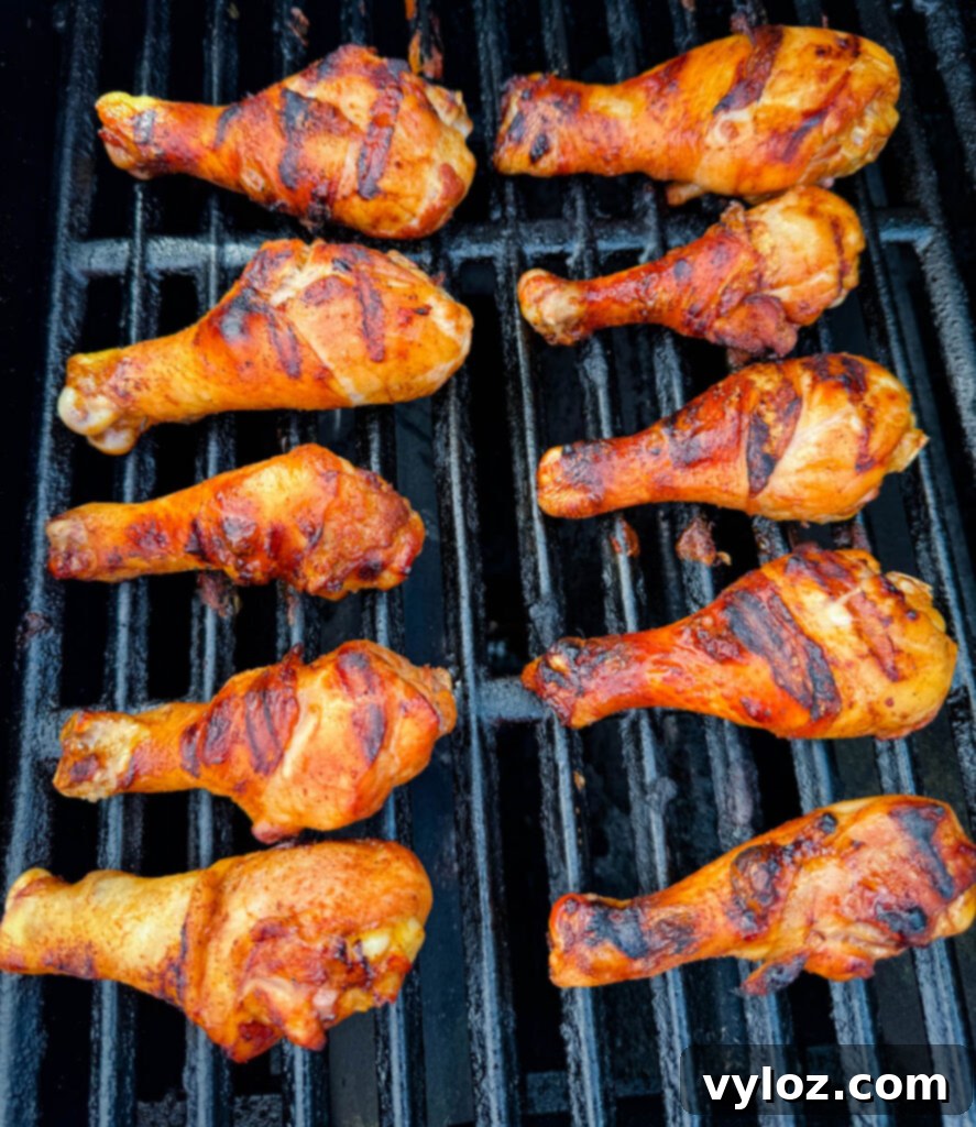 chicken drumsticks on a grill