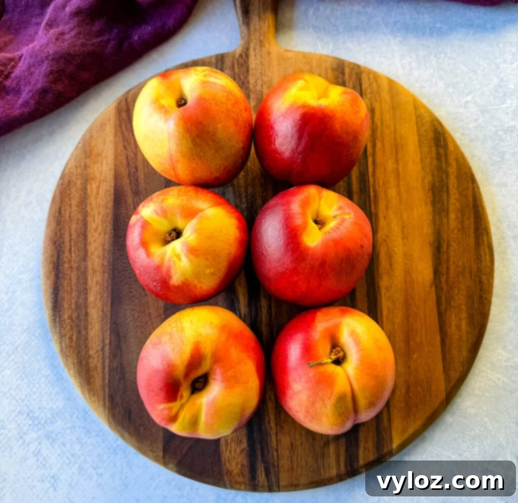 fresh peaches on a flat surface