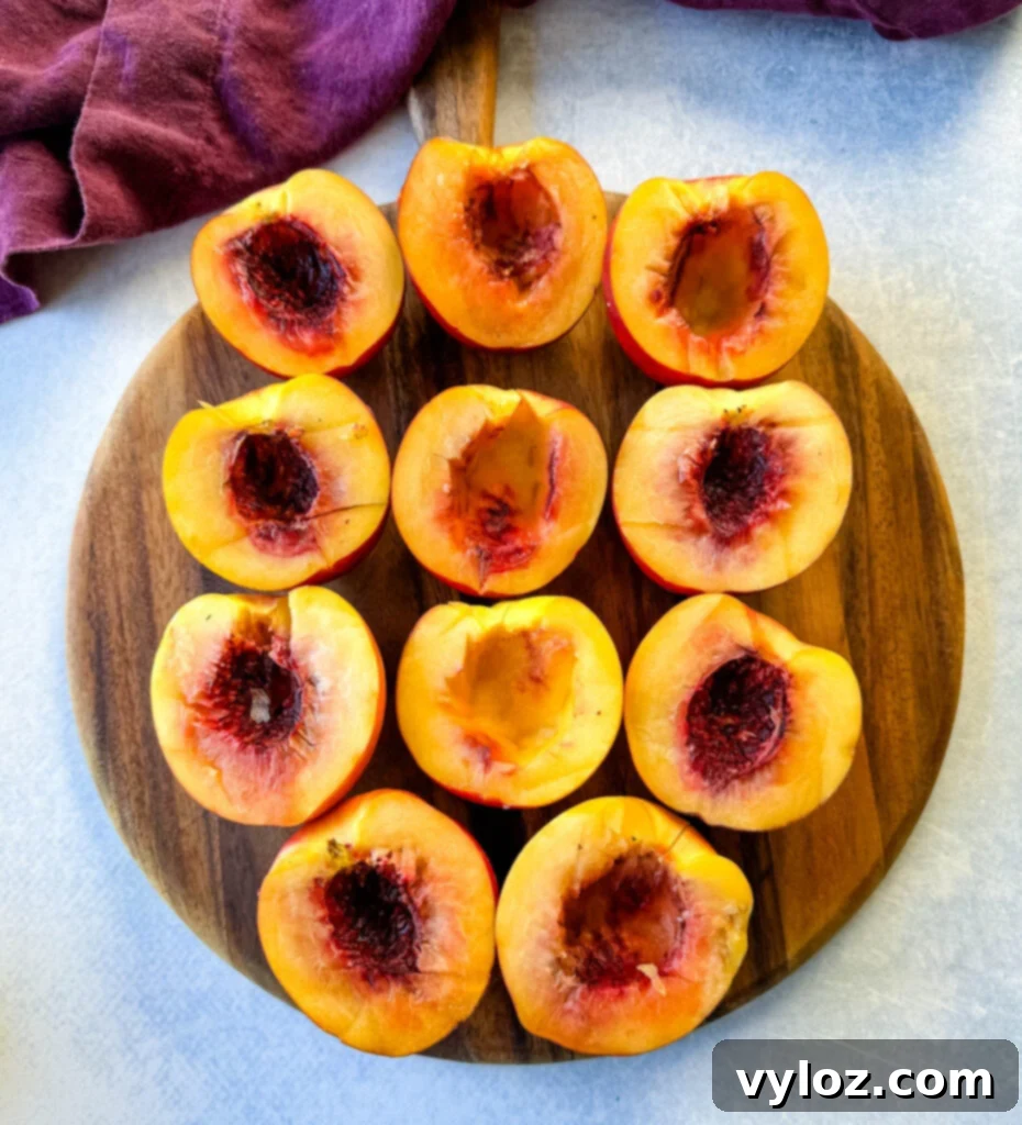 sliced fresh peaches on a flat surface
