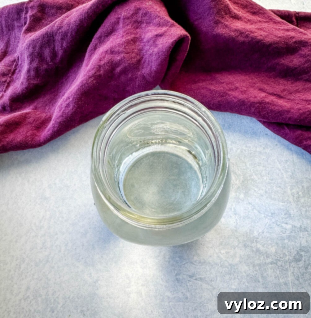 Clear mason jar filled with water, emphasizing the purity of the base ingredient.