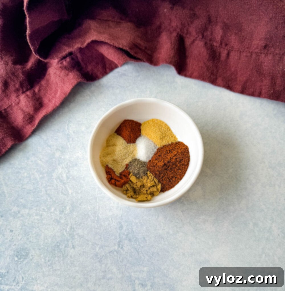 Homemade taco seasoning spices in a white bowl