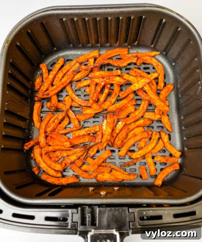 cooked sweet potato fries in an air fryer