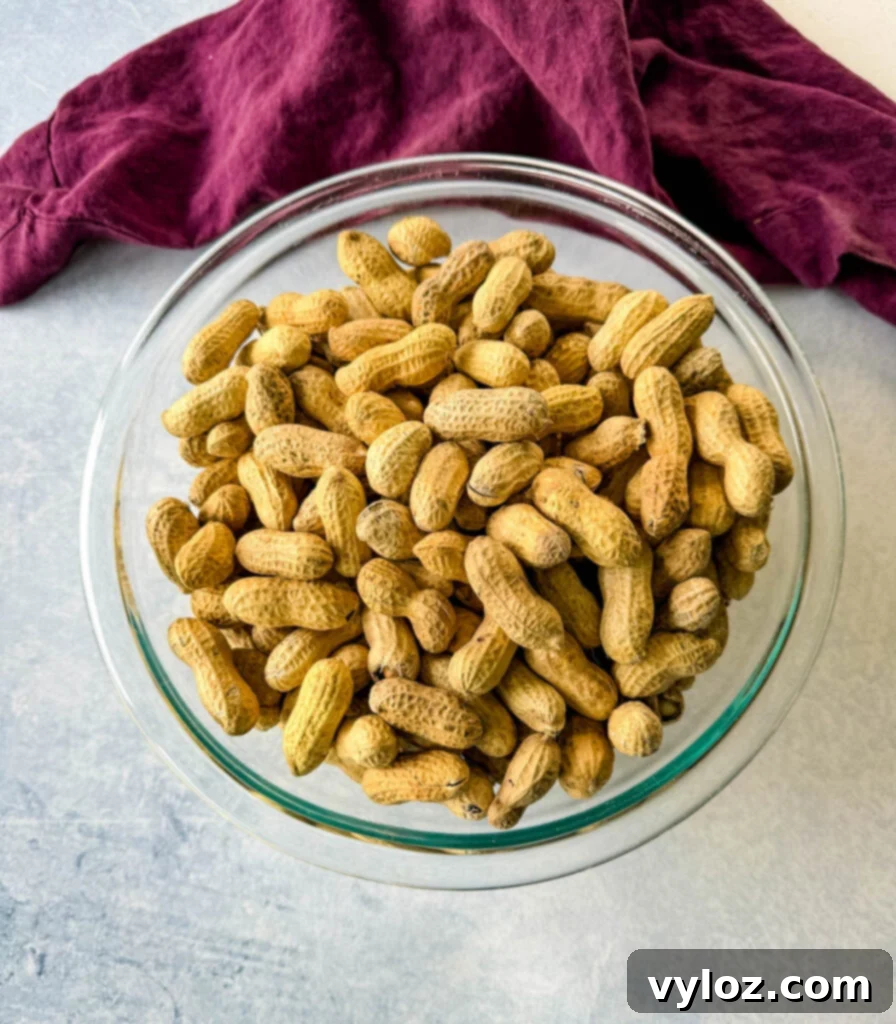 raw peanuts in a glass bowl
