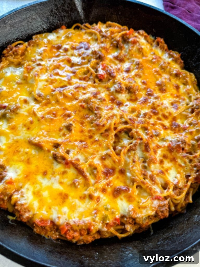 million dollar spaghetti in a cast iron skillet