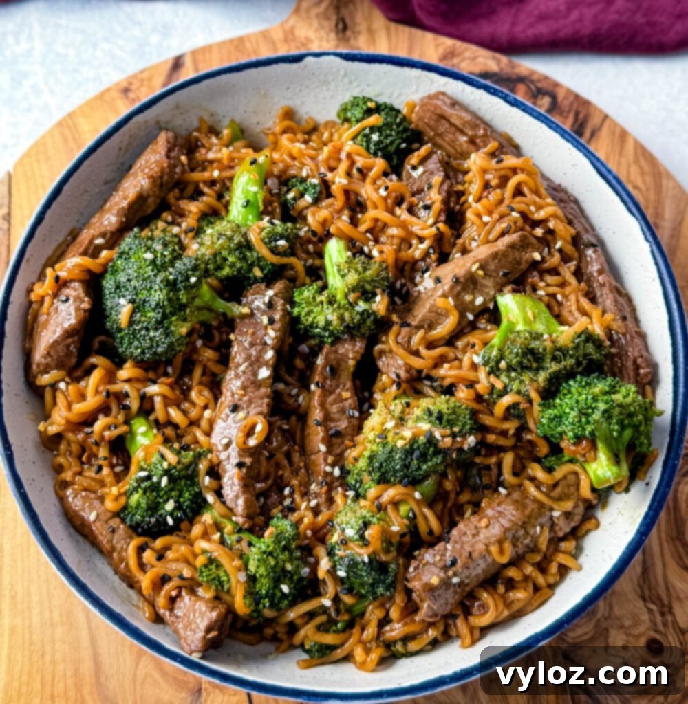 Ramen Noodle Beef and Broccoli Stir Fry 2 beef and broccoli stir fry with ramen noodles in a white bowl