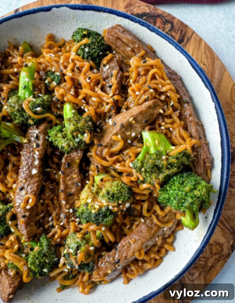 Ramen Noodle Beef and Broccoli Stir Fry 11 beef and broccoli stir fry with ramen noodles in a white bowl