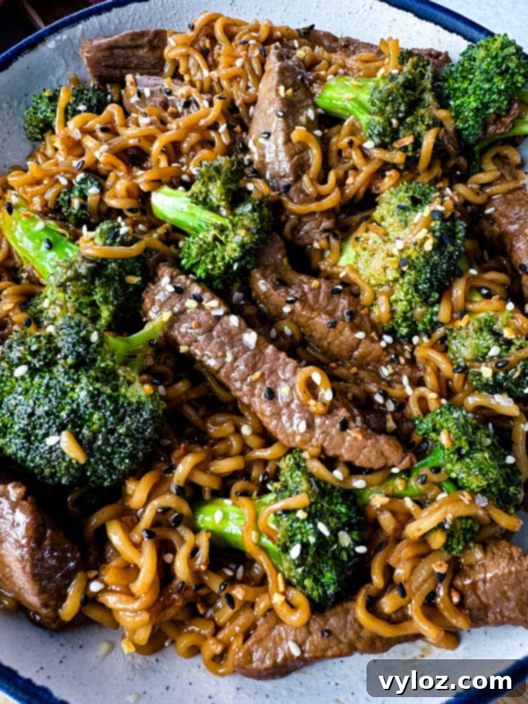 Ramen Noodle Beef and Broccoli Stir Fry 12 beef and broccoli stir fry with ramen noodles in a white bowl