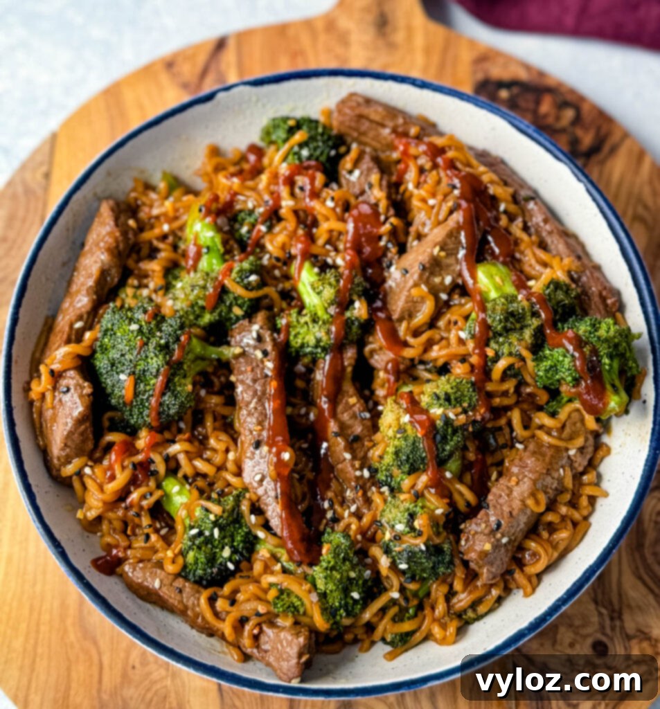 Ramen Noodle Beef and Broccoli Stir Fry 13 beef and broccoli stir fry with ramen noodles in a white bowl