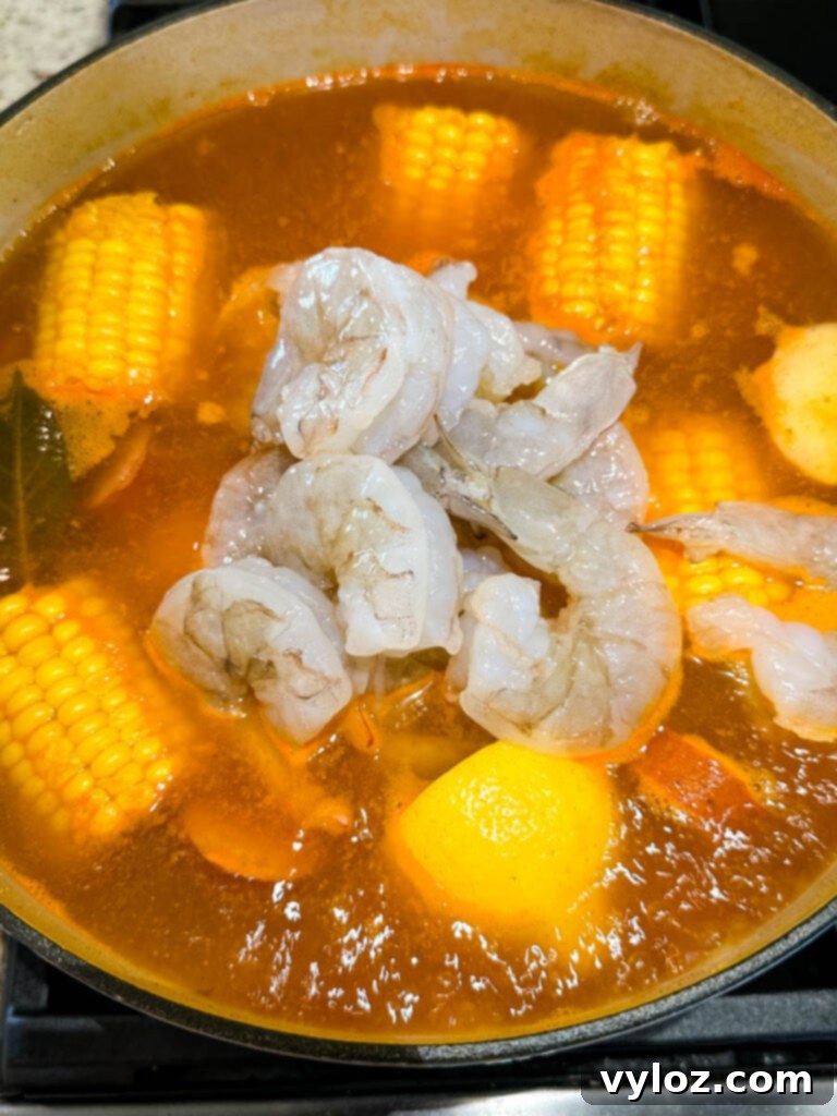 shrimp boil and vegetables in a Dutch oven