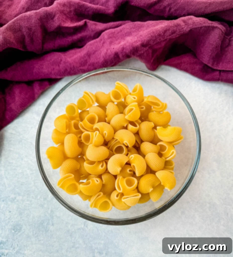 elbow macaroni pasta in a glass bowl
