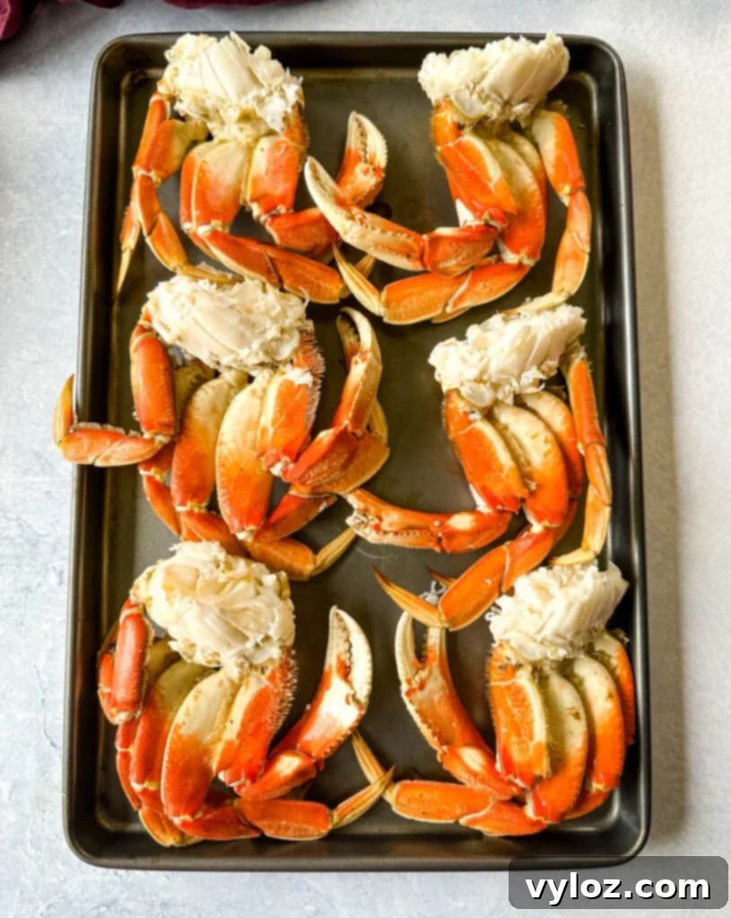 Sweet Dungeness Crab Legs 6 Dungeness crab legs on a sheet pan