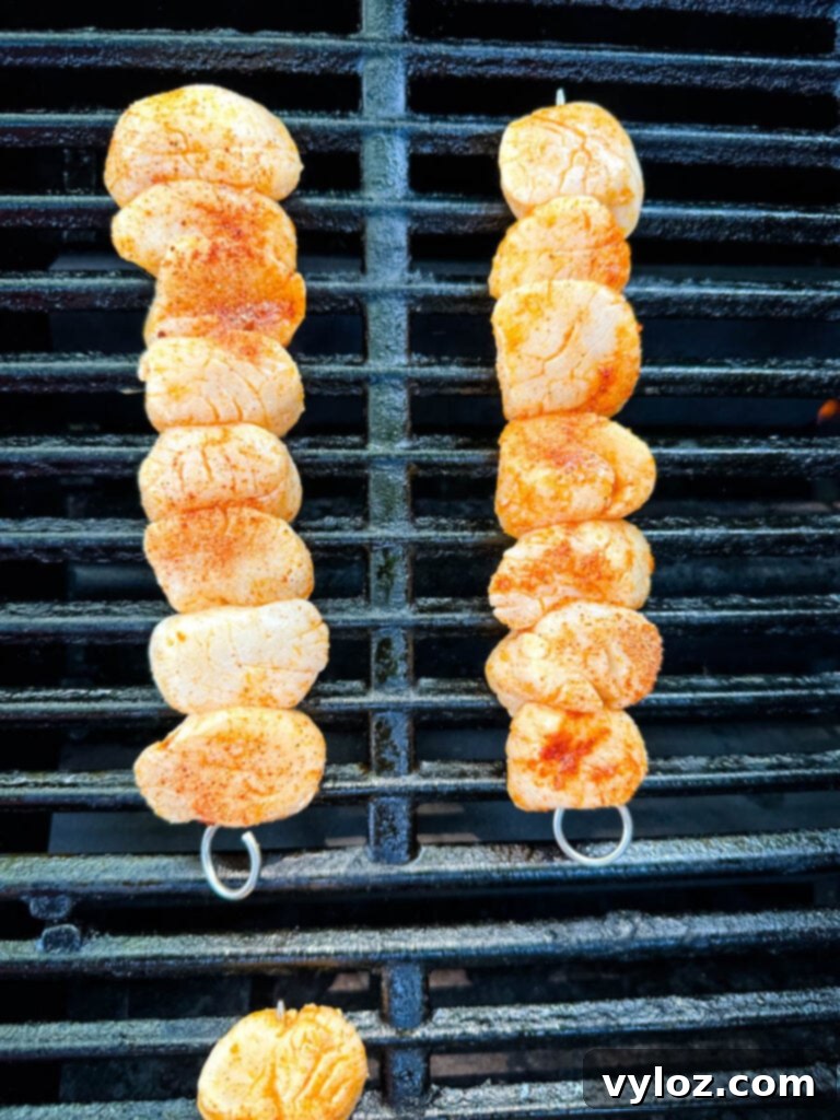 Chargrilled Citrus Scallops 7 seasoned scallops on a grill