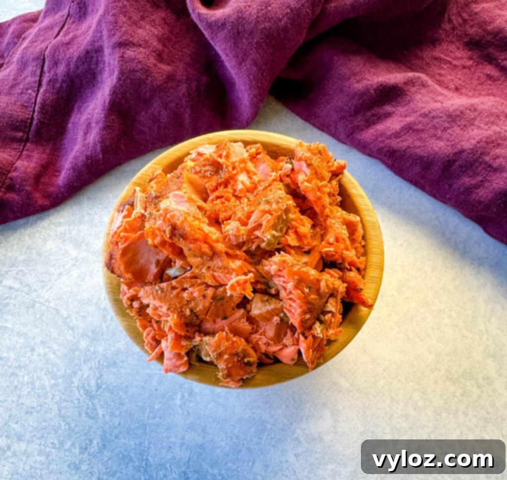 cooked salmon in a bamboo bowl