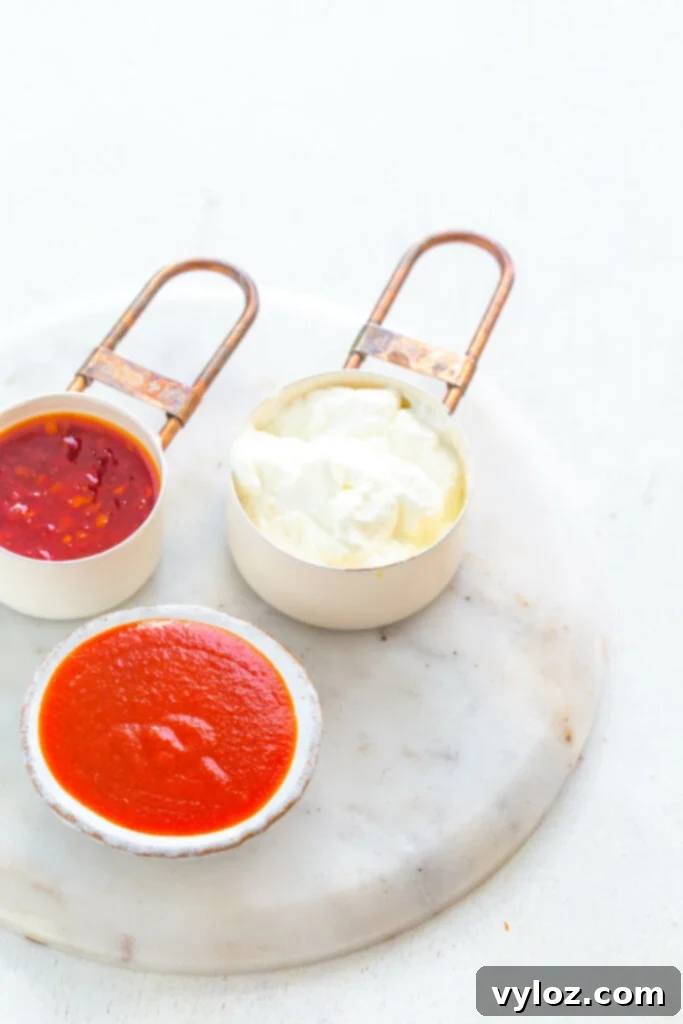 Individual ingredients for Bang Bang Sauce in measuring cups