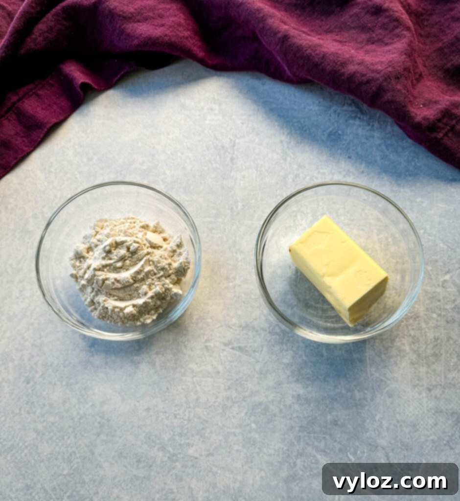 Glass bowls containing all-purpose flour and butter, key ingredients for thickening the chowder.