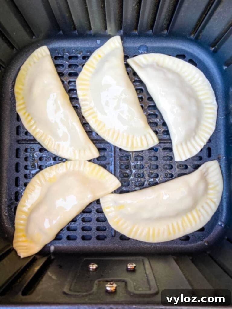 Golden Air Fryer Dessert Empanadas 13 empanadas in an air fryer