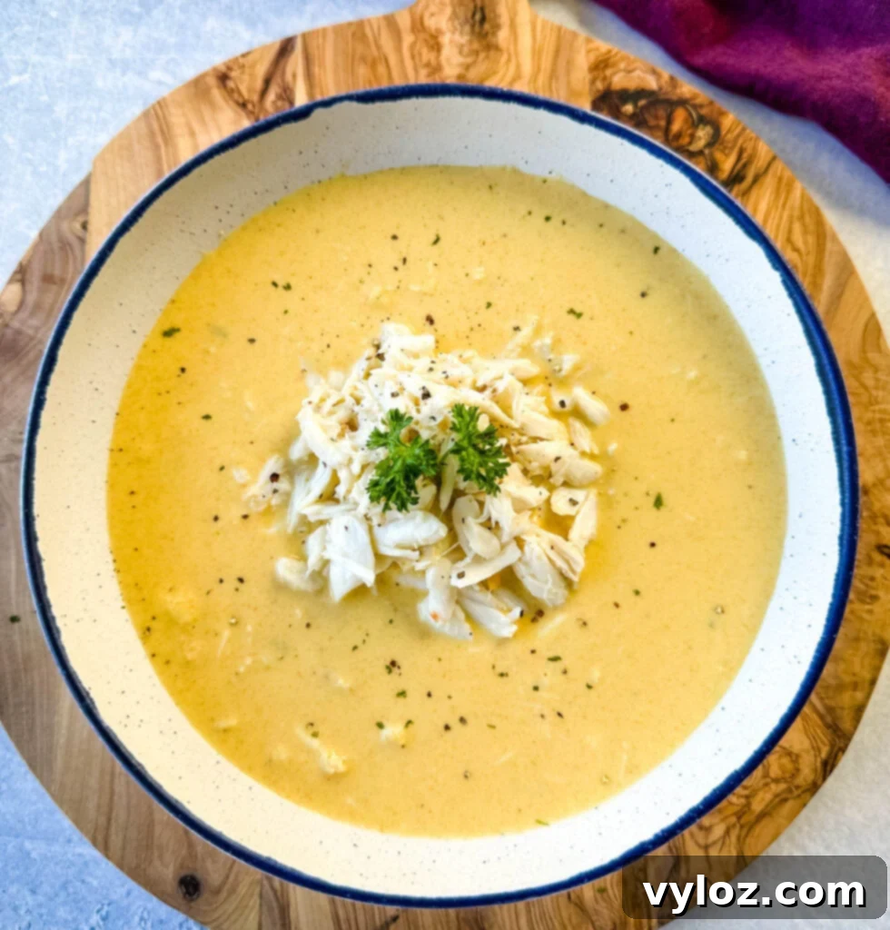 crab bisque in a white bowl with lump crab meat and flour