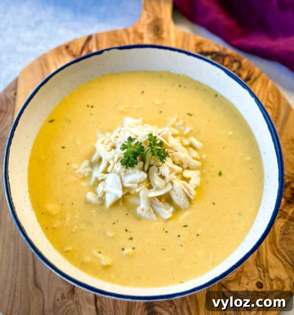 crab bisque in a white bowl with lump crab meat and flour