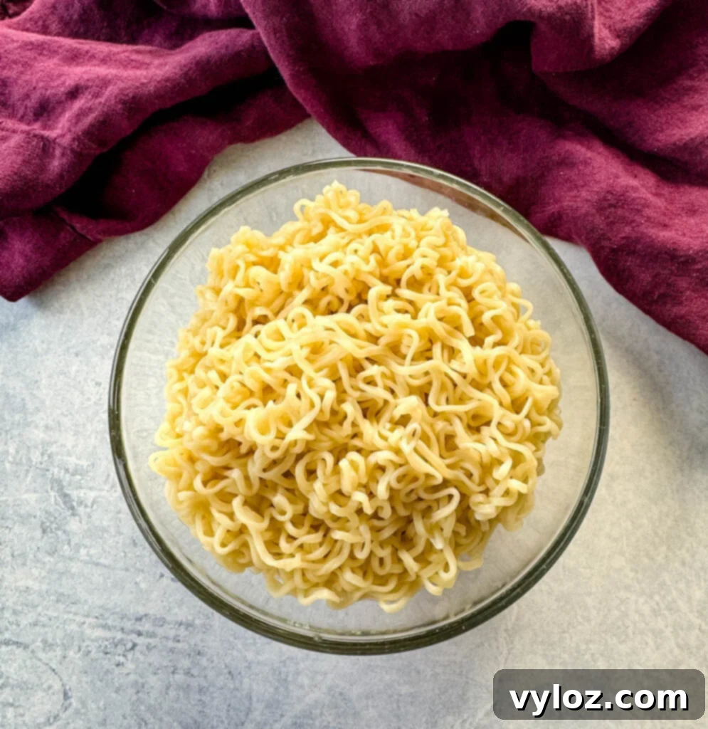 cooked ramen noodles in a glass bowl