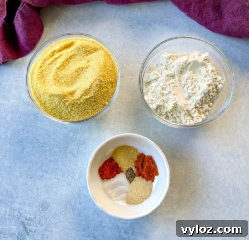 Simple Catfish Nuggets 3 yellow cornmeal, all purpose flour, and spices in separate bowls