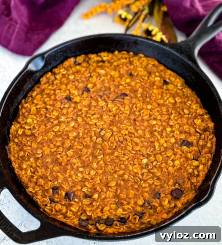 pumpkin baked oatmeal in a cast iron skillet