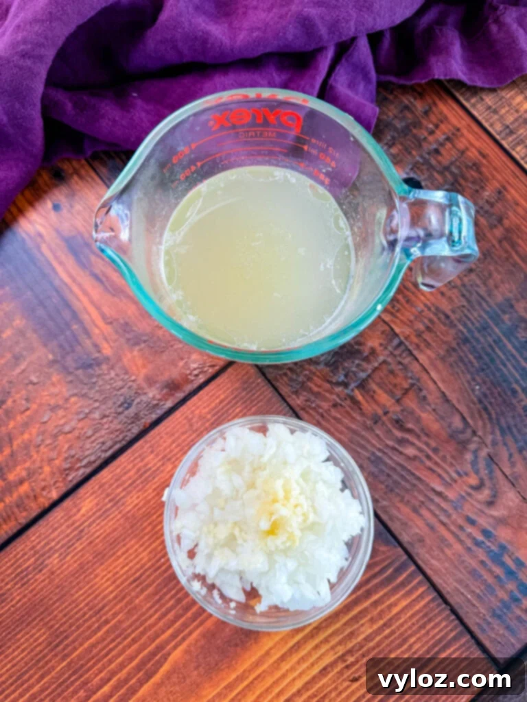 chicken broth, diced onions, and minced garlic in separate bowls