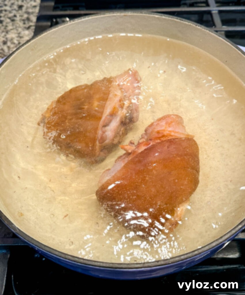 smoked ham hocks in a pot with water