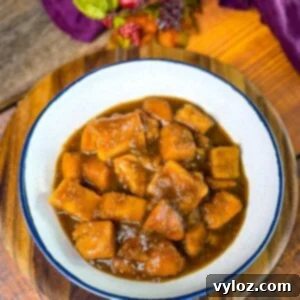 Southern Style Candied Sweet Potatoes 8 canned candied sweet potatoes in a white bowl