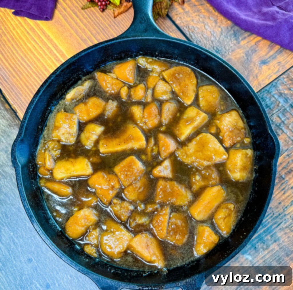 Southern Style Candied Sweet Potatoes 9 canned candied sweet potatoes in a cast iron skillet