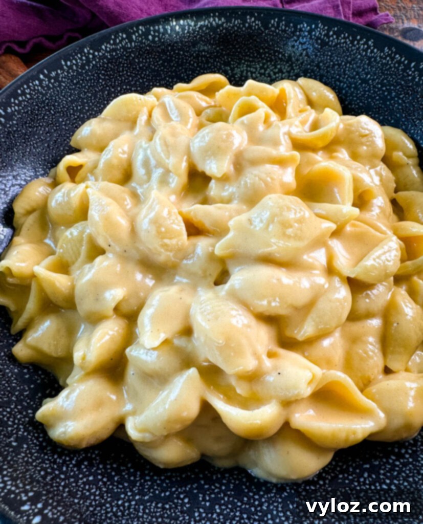 A comforting bowl of rich, golden stovetop mac and cheese, ready to be enjoyed as a classic Southern comfort food