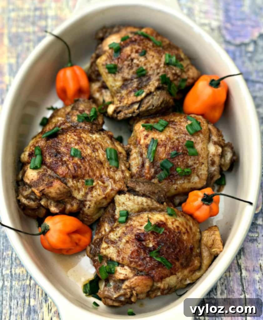 Flavorful Instant Pot Jamaican Jerk Chicken Thighs 3 Close-up of Instant Pot Jamaican jerk chicken thighs, showcasing the rich, spiced crust.