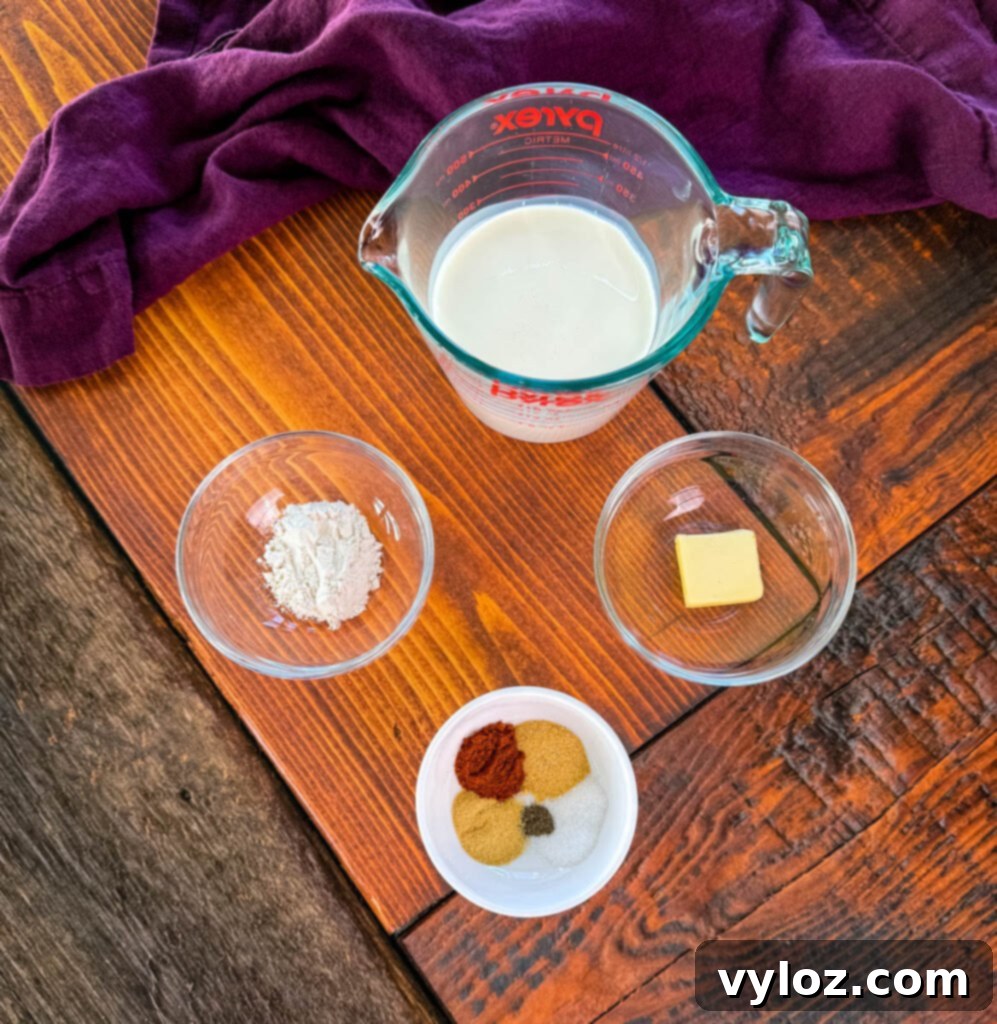 heavy cream, flour, butter, and spices in separate bowls
