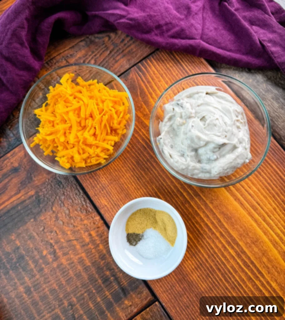 Creamy Green Bean Delight 4 grated cheddar cheese, homemade cream of soup, and spices in separate bowls